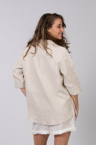 DE TIAMO Breeze Linen Shirt in natural — back view showing relaxed linen drape and side slits