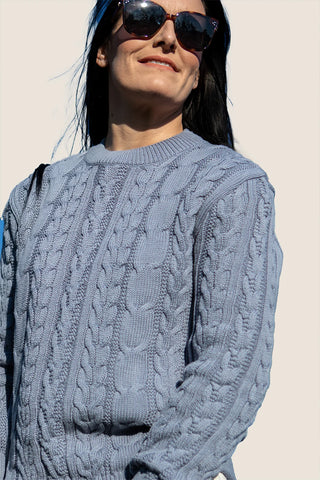 DE TIAMO Cable Knit Sweater in denim — front view, cool blue 100% cotton cable knit for cooler days