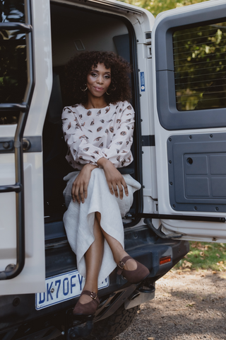 DE TIAMO Cleo Cotton Long Sleeve Top in cream — front view, relaxed long-sleeve silhouette in premium cotton