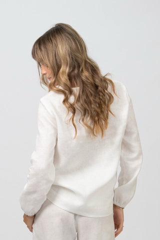 DE TIAMO Cleo Long Sleeve Top in white — lifestyle shot, effortless smart-casual linen styling