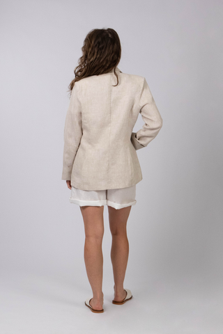DE TIAMO Sally Linen Jacket in natural — back view showing structured linen tailoring and clean silhouette