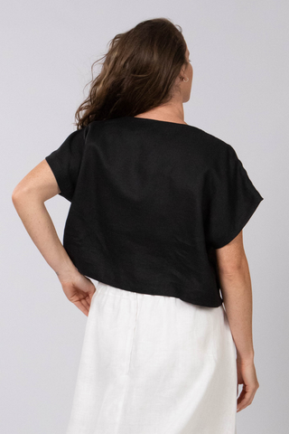 DE TIAMO Willow Drop Shoulder Linen Top in black — back view showing clean drop-shoulder seam detail