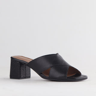 Froggie Crisscross Block Heel Mule Sandal in black — angled side view showing block heel
